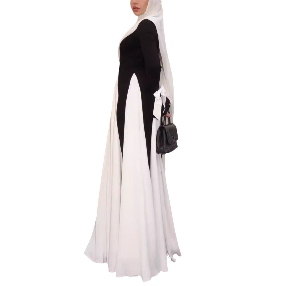 This abaya redefines modern modest fashion with its sleek design and elegant flow.