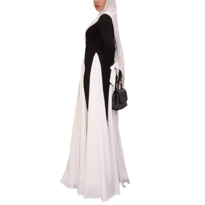This abaya redefines modern modest fashion with its sleek design and elegant flow.