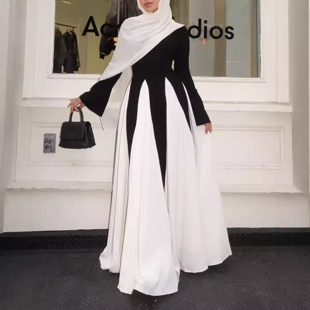 This abaya redefines modern modest fashion with its sleek design and elegant flow.