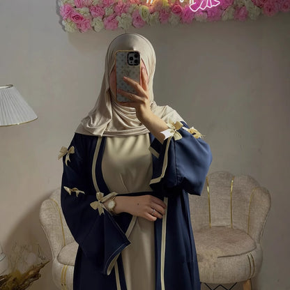 This abaya is crafted with soft flowing fabric.