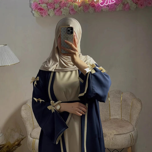 This abaya is crafted with soft flowing fabric.