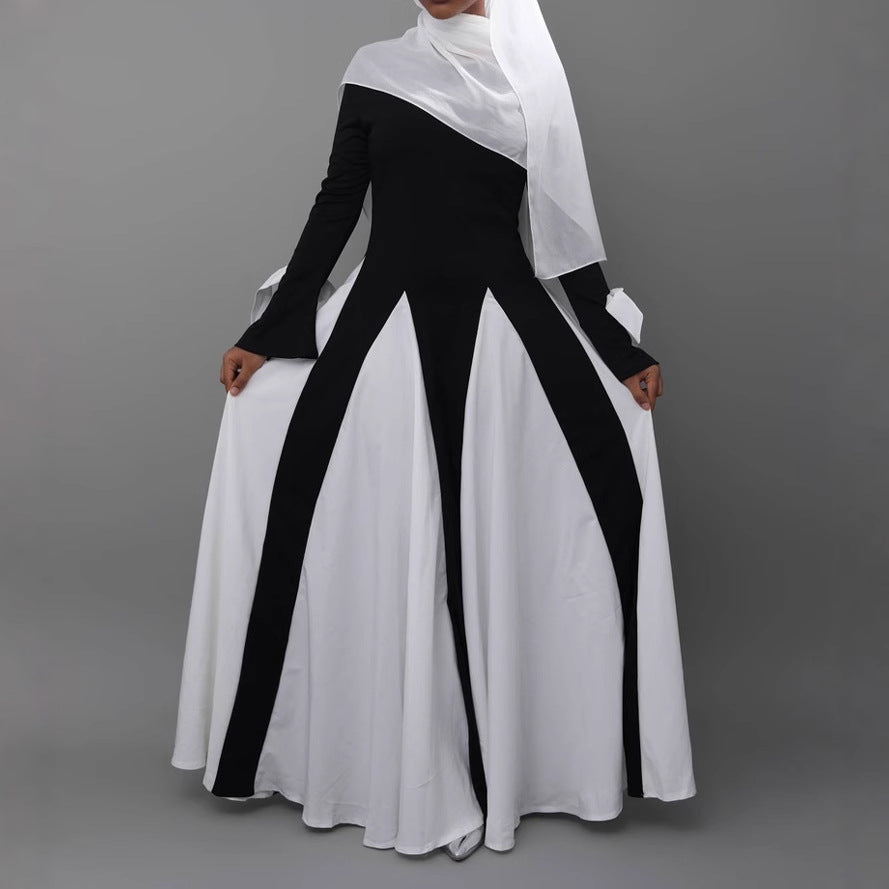 This abaya redefines modern modest fashion with its sleek design and elegant flow.