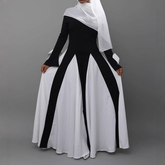 This abaya redefines modern modest fashion with its sleek design and elegant flow.