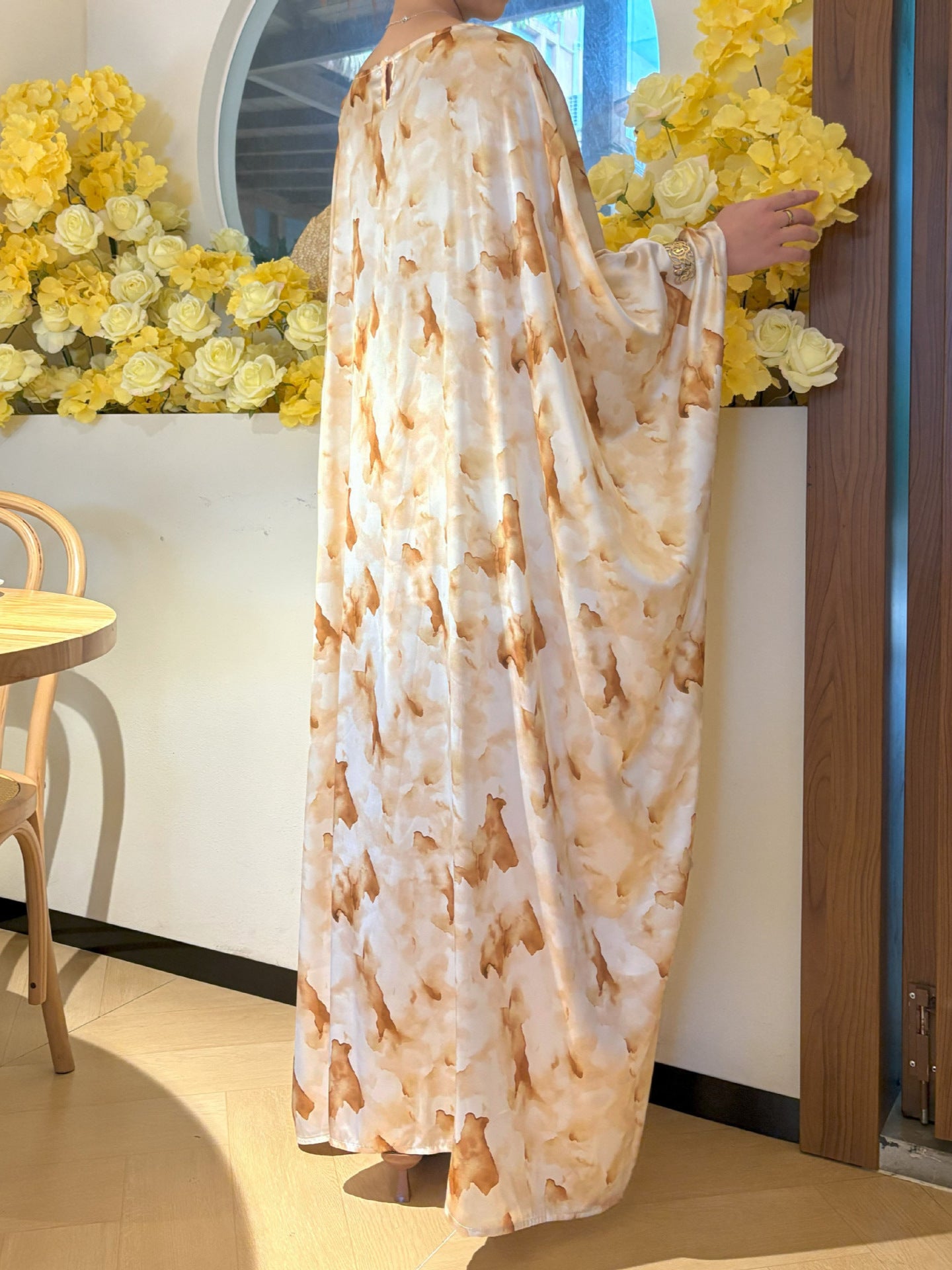 Elegant Long Dress with Yellow Floral Print and Drawstring Straps