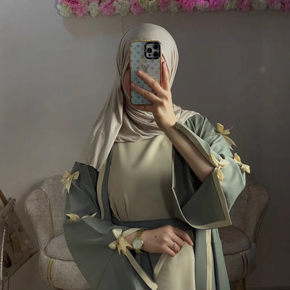 This abaya is crafted with soft flowing fabric.