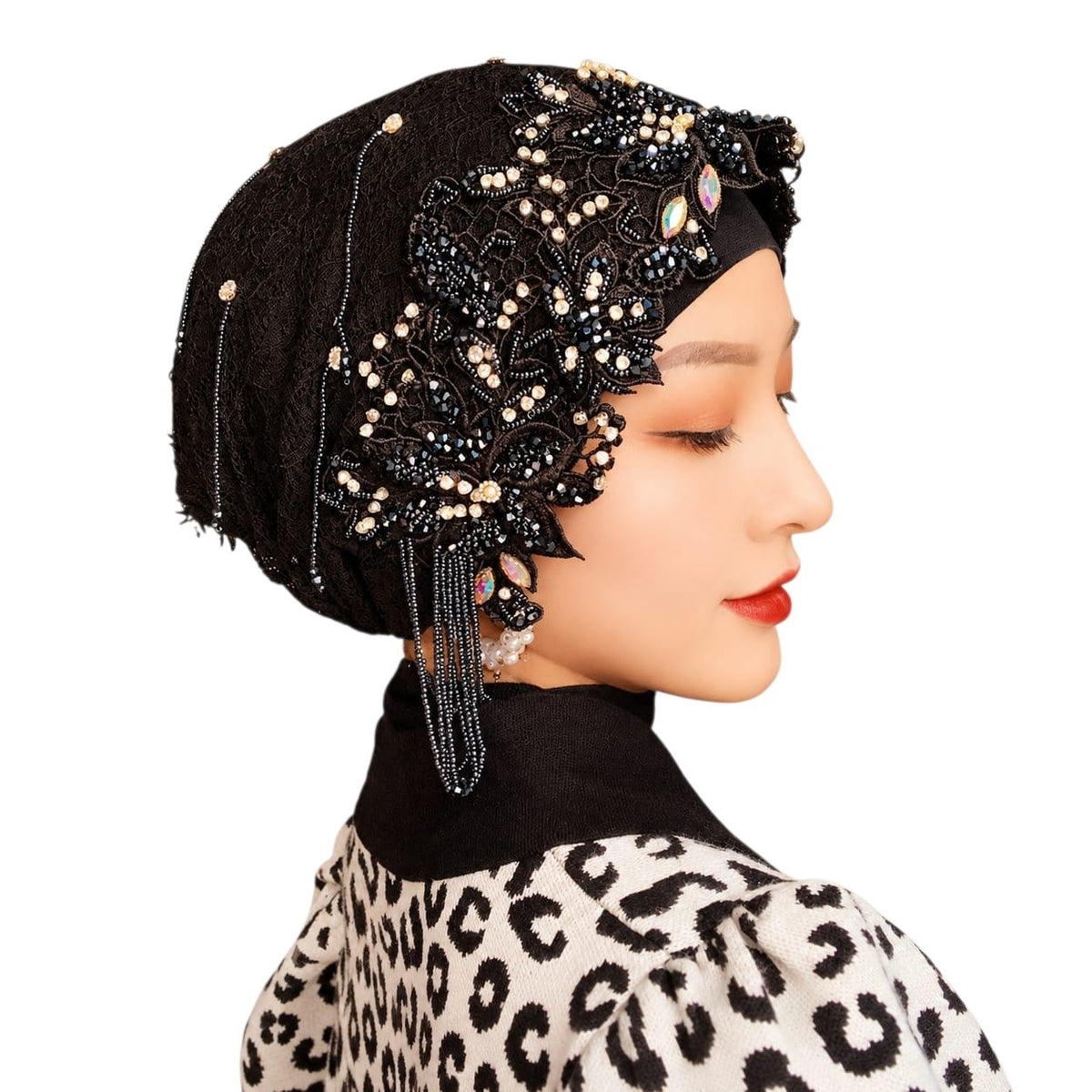 Anab Abaya black lace hijab featuring intricate floral embroidery, beaded accents, and elegant pearl hanging details.