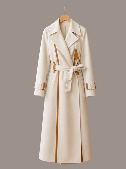 Anab Abaya elegant cream belted trench coat with brown leather contrast detailing and a slim tailored fit.