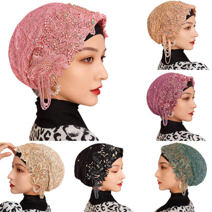 Anab Abaya handmade lace hijab head covering with floral embroidery, beads, crystals, and hanging pearl-style details.
